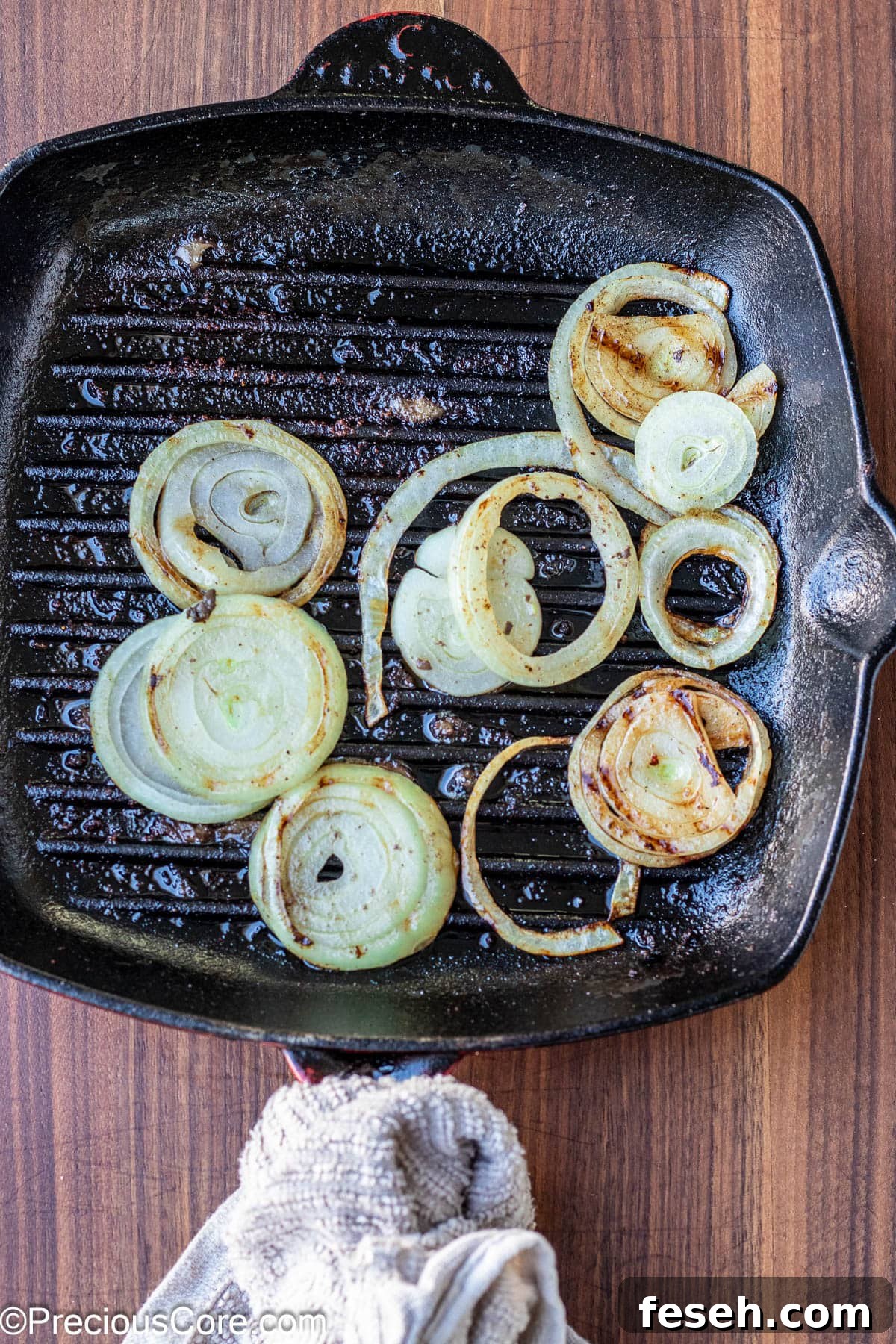 Grilled onions in a grill pan.