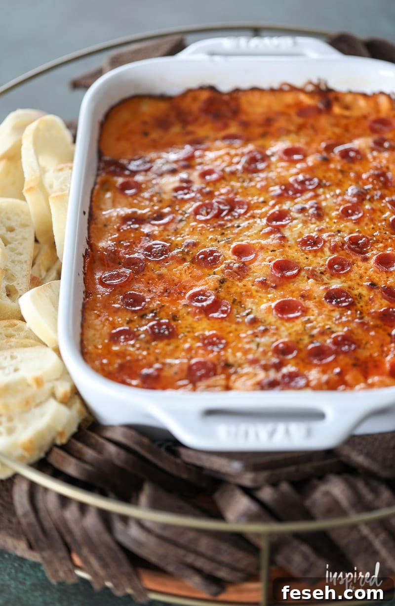 Be the winner at your next gathering with The Ultimate Sausage Pizza Dip!
