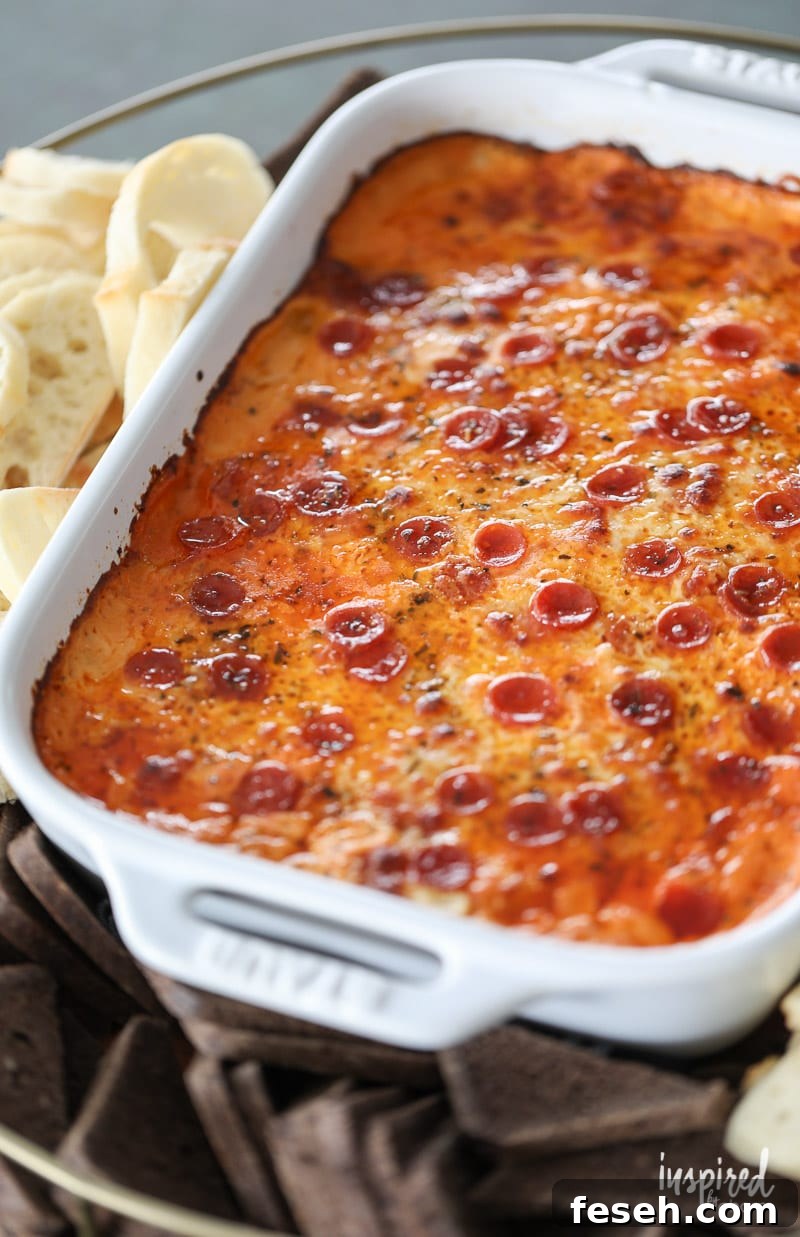 The Ultimate Sausage Pizza Dip appetizer for entertaining. 