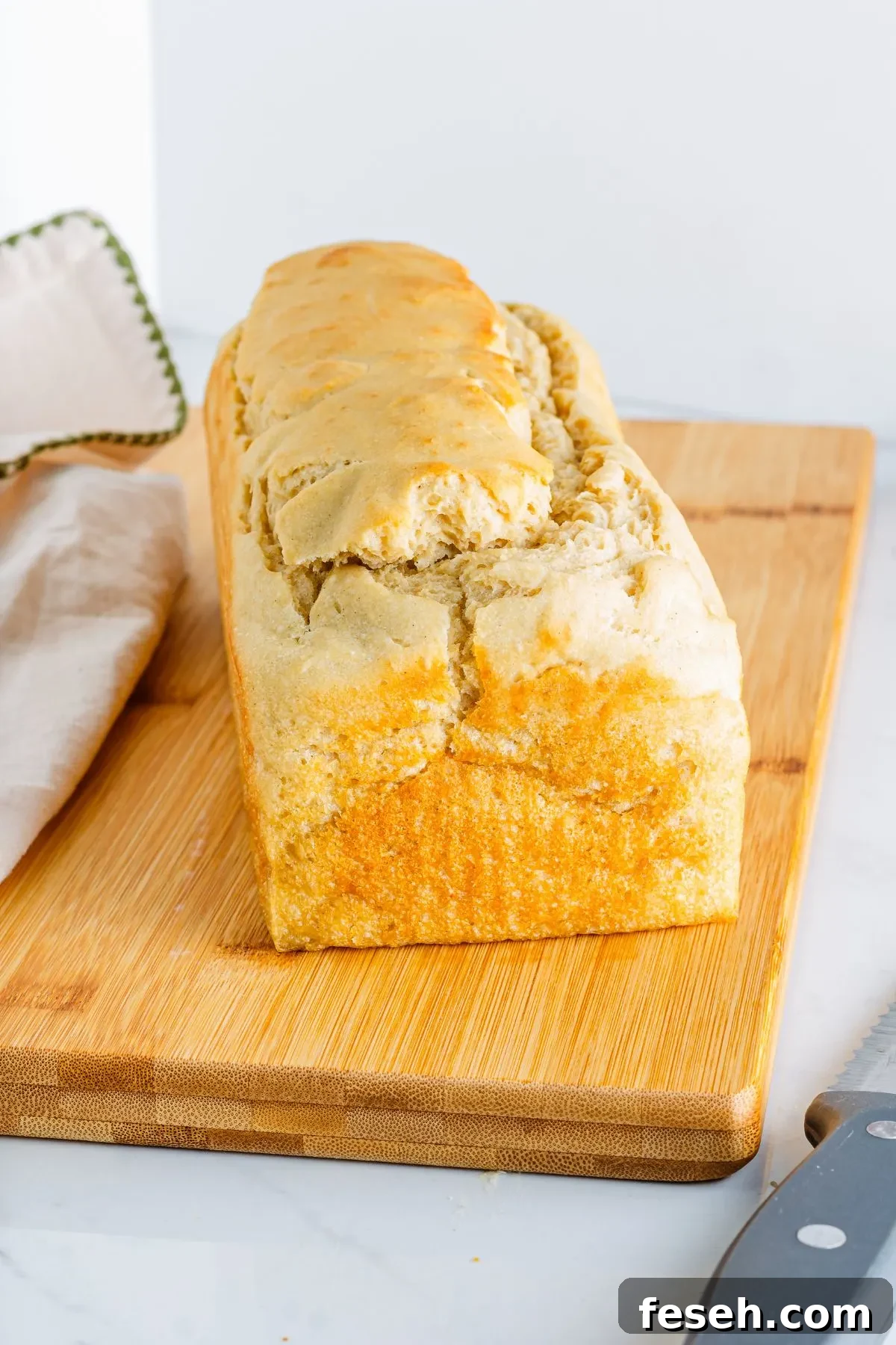 Looking down on a loaf of homemade from scratch dairy free white bread. 