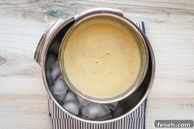 Cooling the crème anglaise on ice.