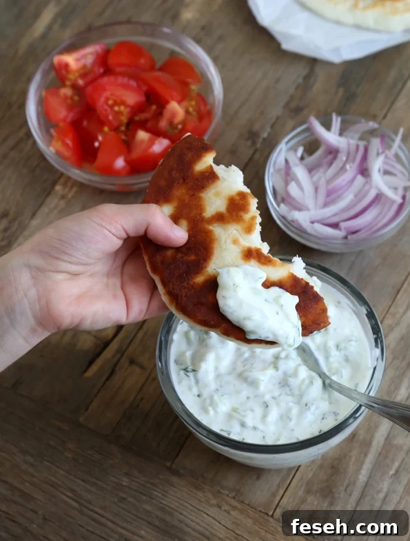 Chicken gyros being assembled 
