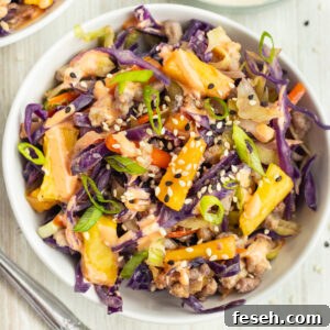 Picture of egg roll in a bowl in a small white bowl.
