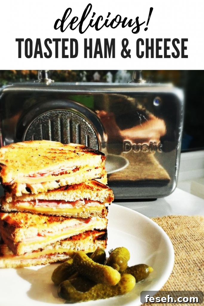 toasted ham and cheese sandwiches piled up on a plate with a side of cornichons Dualit stainless steel radio in the background. Text overlay "delicious toasted ham and cheese"
