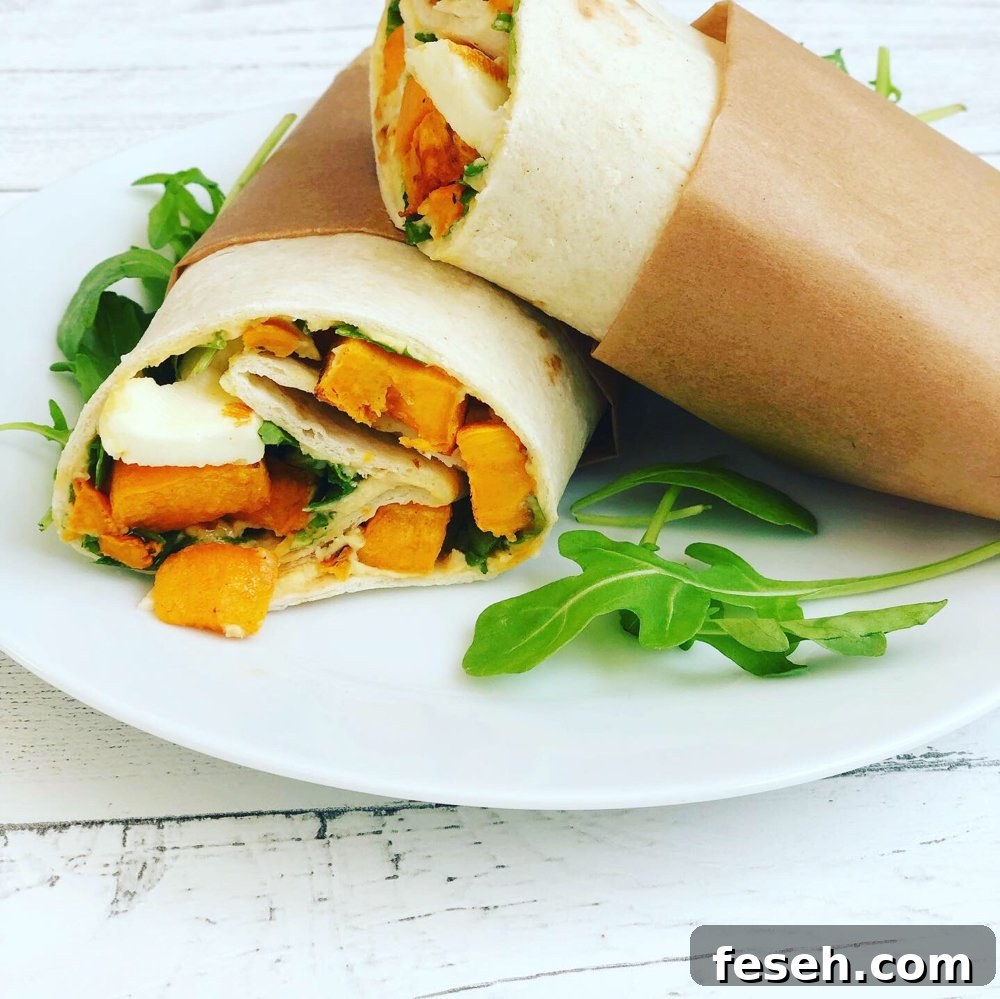 vegetarian wrap with sweet potatoes, halloumi, hummus and salad