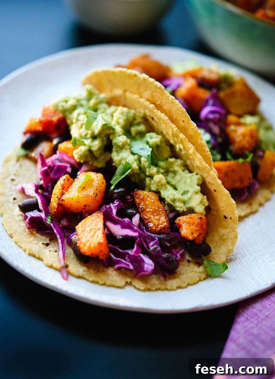 Healthy roasted butternut squash tacos, perfect for weeknights or taco parties! cookieandkate.com