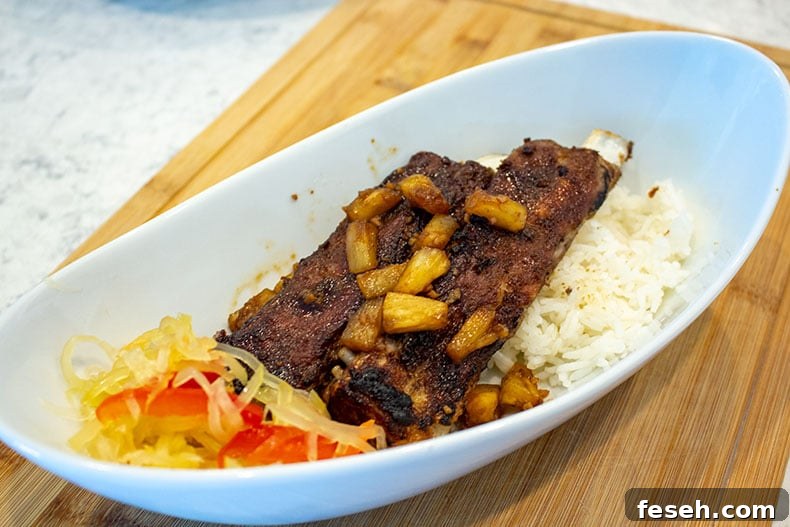 Instant Pot Pork Spare Ribs over white rice with atchara.