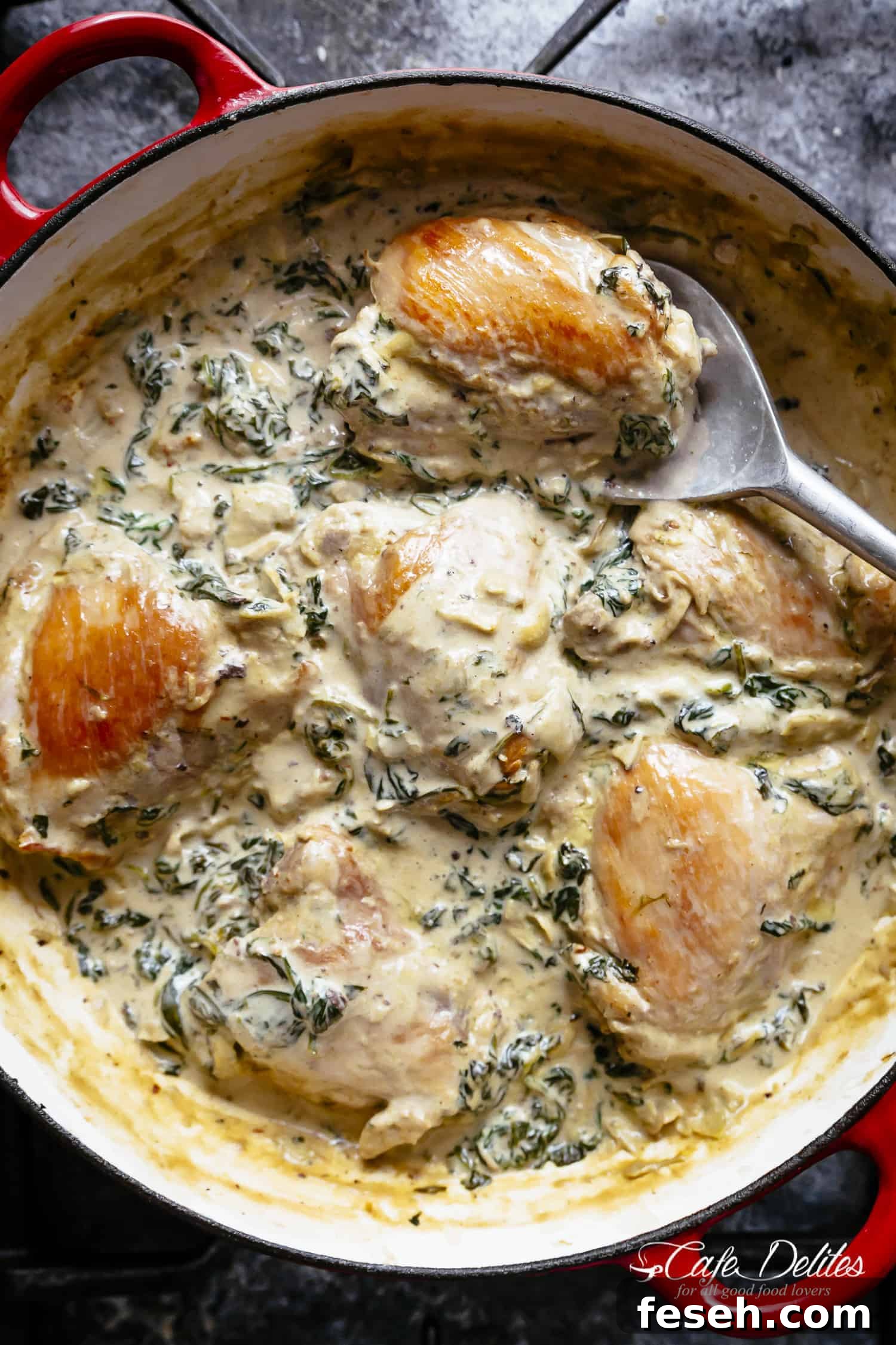 Creamy Spinach Artichoke Chicken Thighs in one skillet