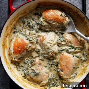 Creamy Spinach Artichoke Chicken Thighs in a pan
