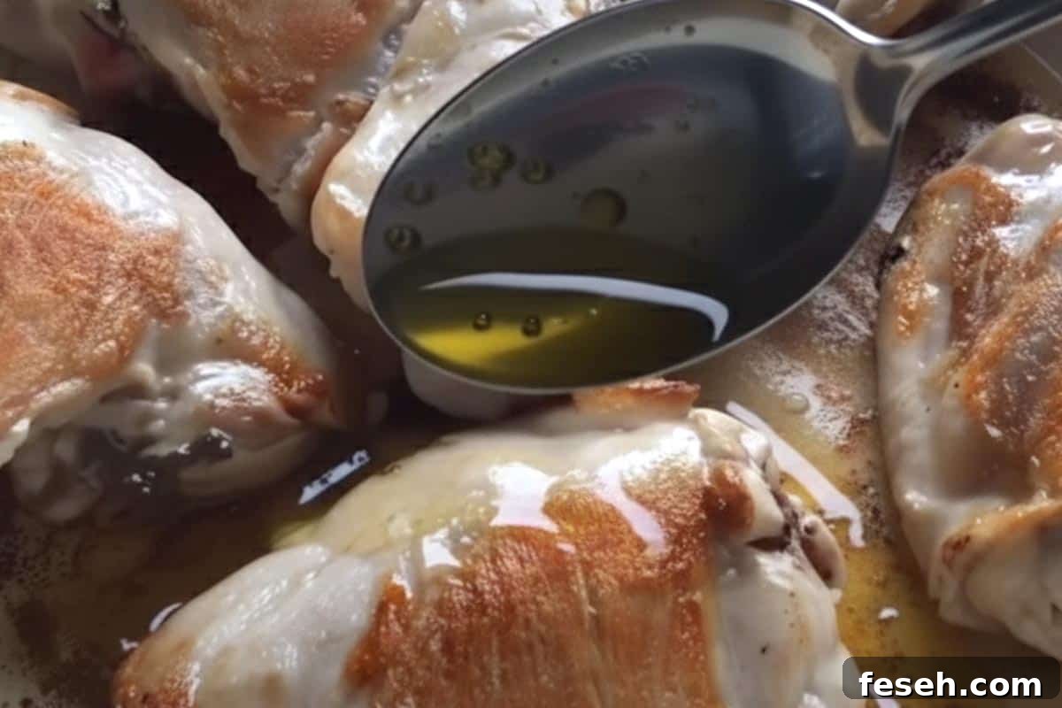 Removing excess fat from the pan