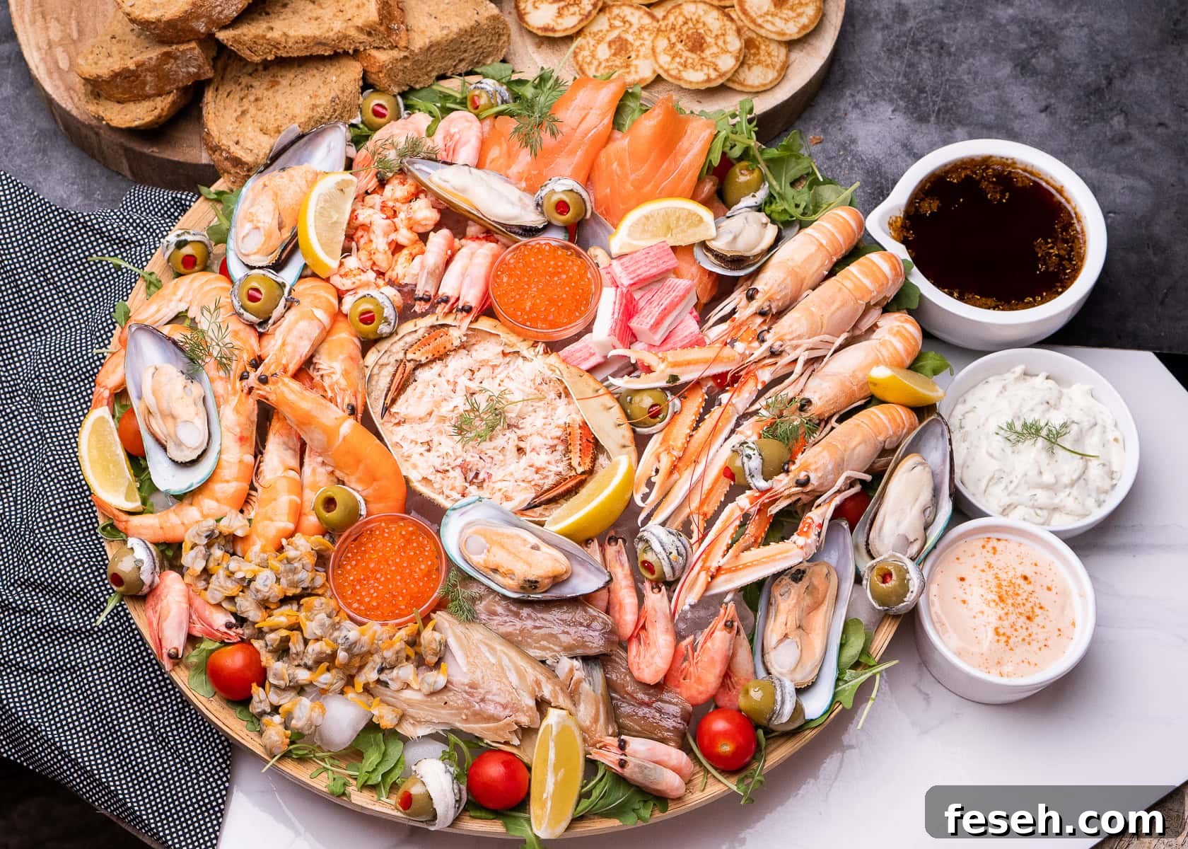 Tartare Sauce, seafood boil sauce, cocktail Marie rose sauce served with a big seafood platter
