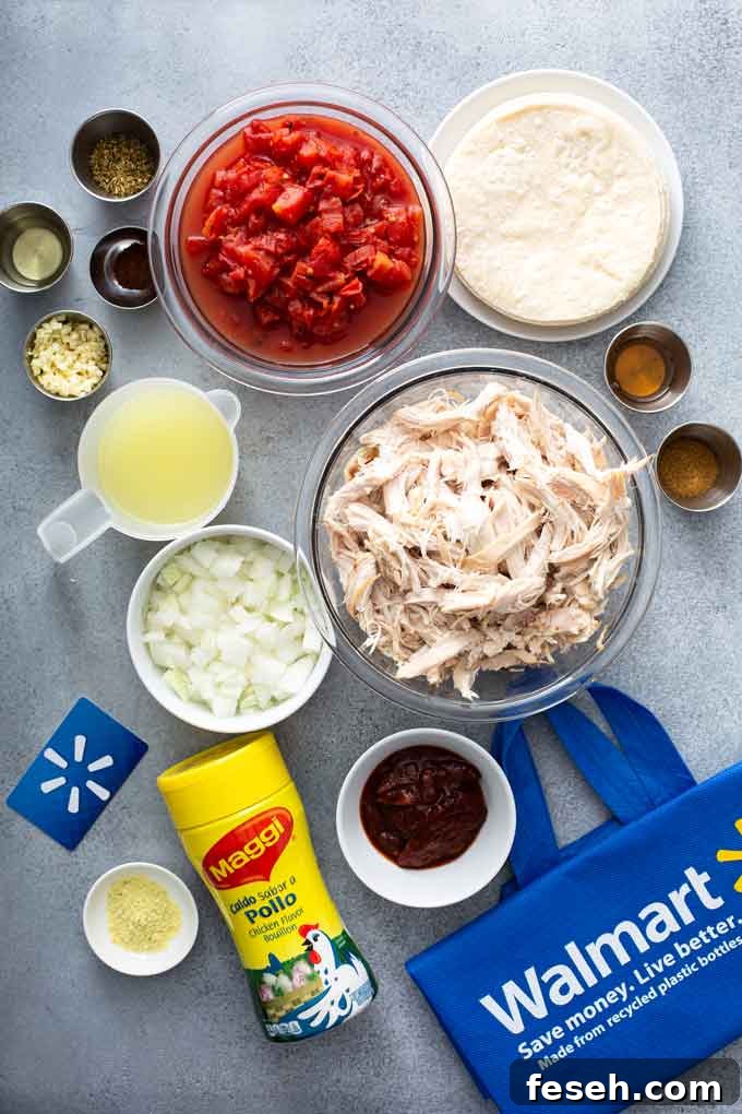 Ingredients to make Mexican shredded chicken tacos.