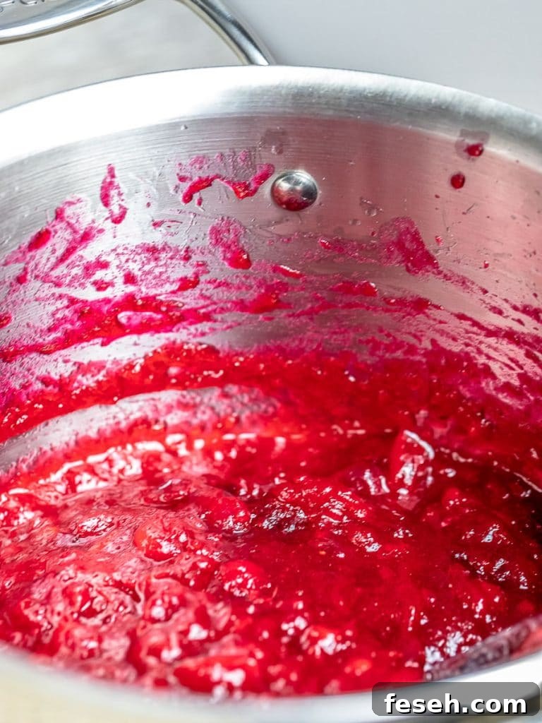 homemade cranberry sauce with maple syrup in a pot