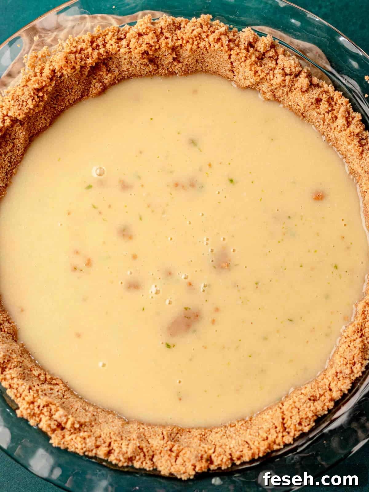 Pie batter in a crust.