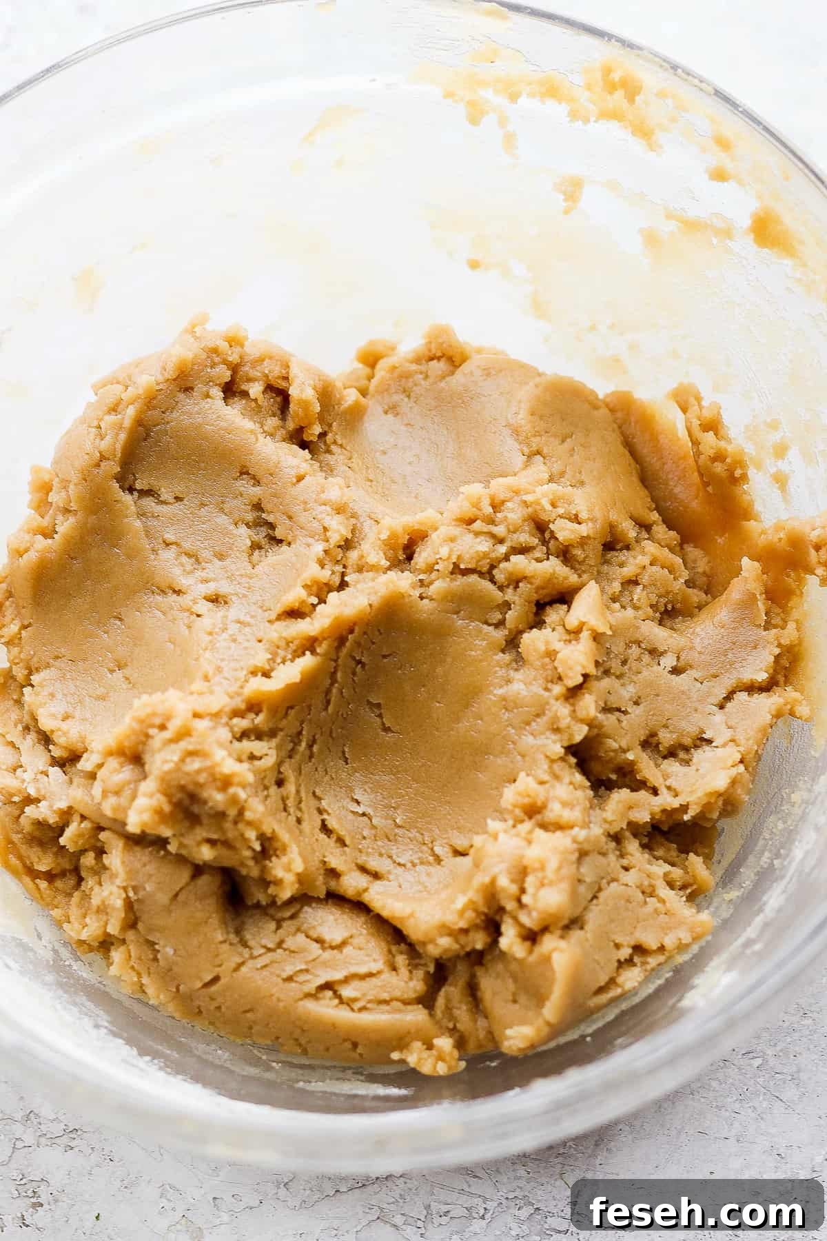 peanut butter in a glass bowl.
