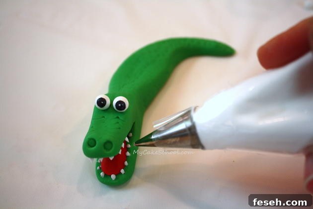 Alligator Swamp Party Cake! Learn to model CUTE alligators in this free cake decorating tutorial by MyCakeSchool.com!