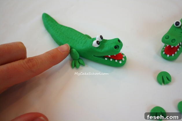 Alligator Swamp Party Cake! Learn to model CUTE alligators in this free cake decorating tutorial by MyCakeSchool.com!