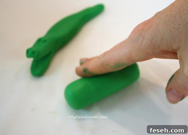 Alligator Swamp Party Cake! Learn to model CUTE alligators in this free cake decorating tutorial by MyCakeSchool.com!