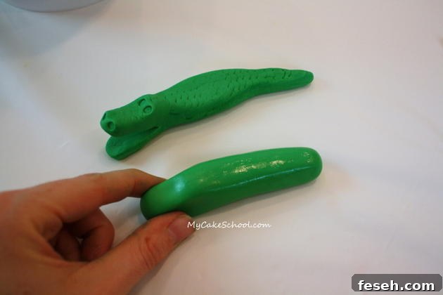 Alligator Swamp Party Cake! Learn to model CUTE alligators in this free cake decorating tutorial by MyCakeSchool.com!