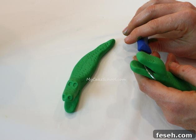 Alligator Swamp Party Cake! Learn to model CUTE alligators in this free cake decorating tutorial by MyCakeSchool.com!