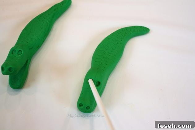 Alligator Swamp Party Cake! Learn to model CUTE alligators in this free cake decorating tutorial by MyCakeSchool.com!