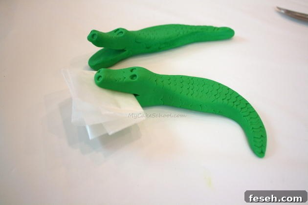 Alligator Swamp Party Cake! Learn to model CUTE alligators in this free cake decorating tutorial by MyCakeSchool.com!