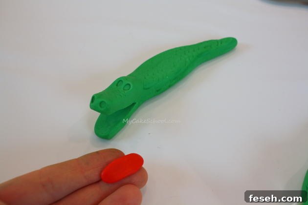 Alligator Swamp Party Cake! Learn to model CUTE alligators in this free cake decorating tutorial by MyCakeSchool.com!