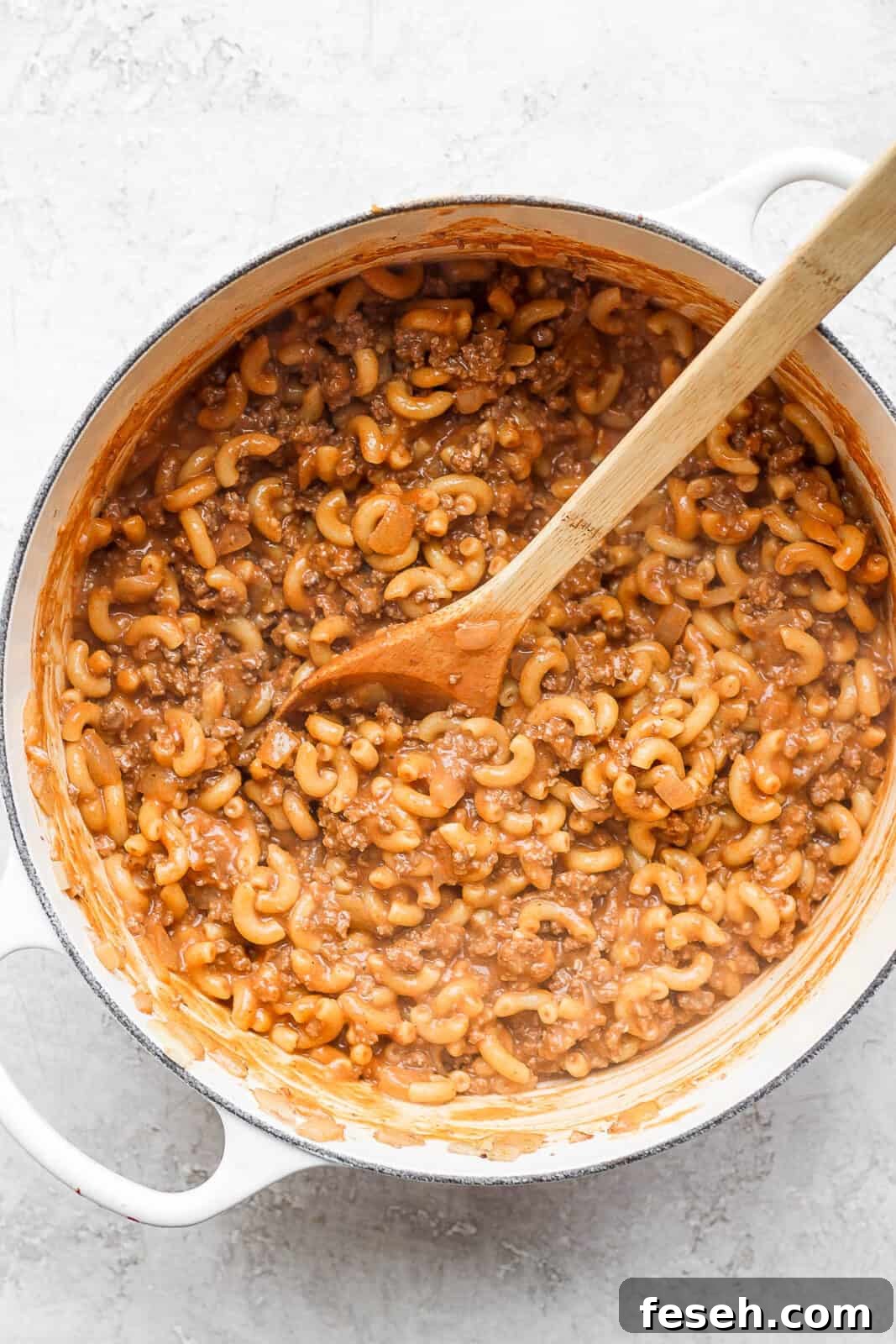 Healthy hamburger helper in a dutch oven before adding the cheese.