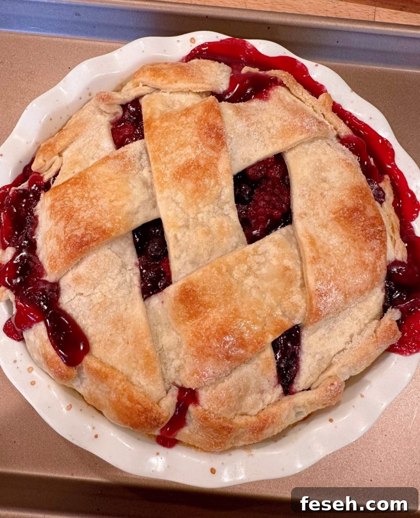 Pie Fresh out of the oven! Pie filling bubbled over edges of crust.