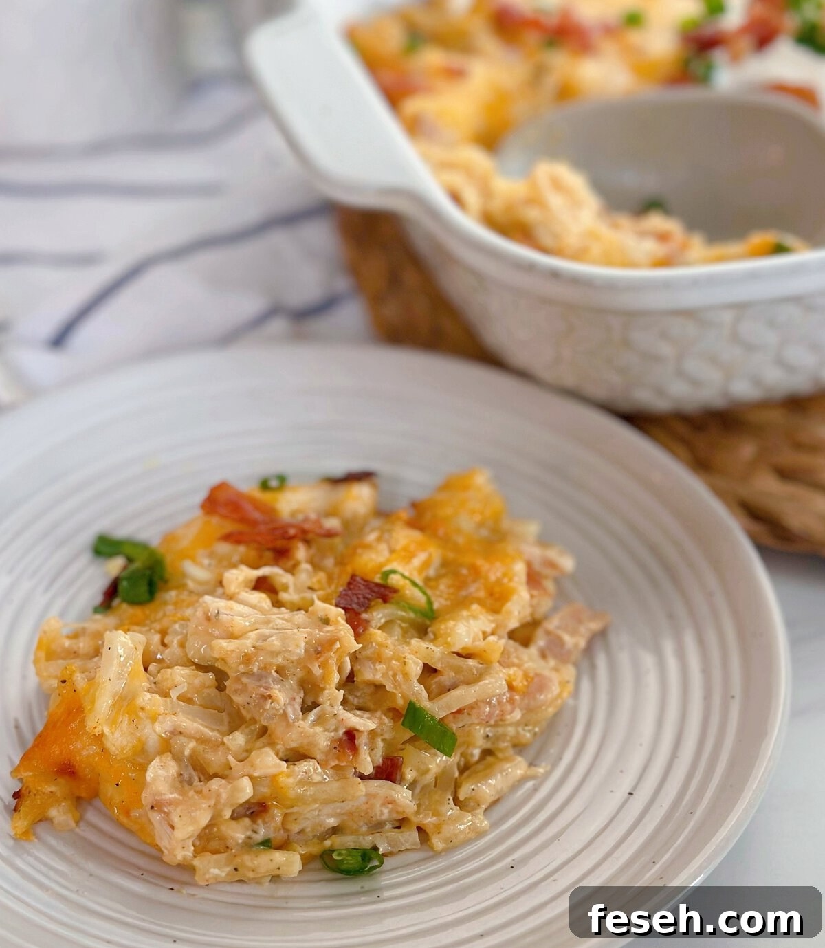 Loaded Hash Brown and Chicken Casserole on a dinner plate.