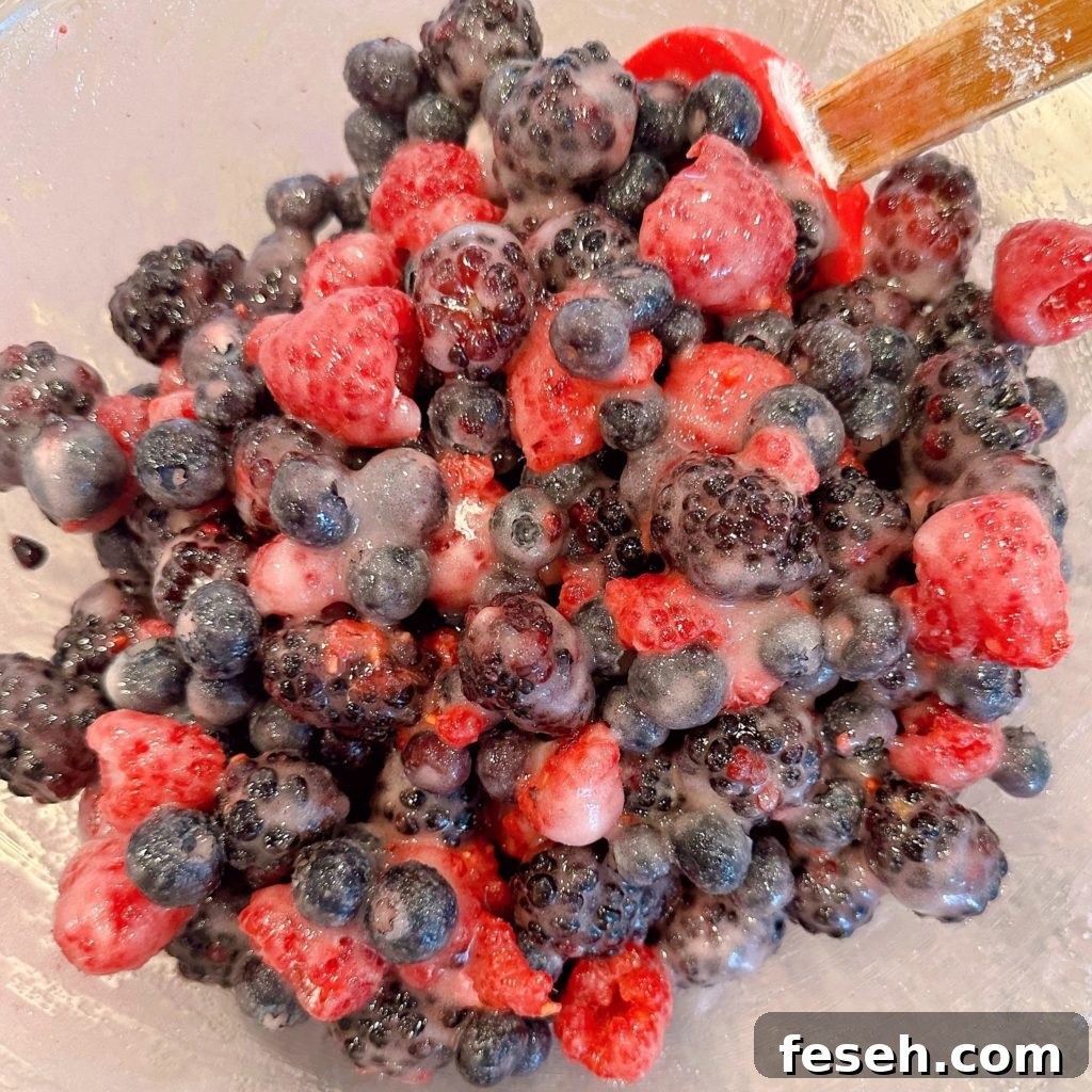 Fresh Berries, sugar, lemon juice, and cornstarch in a large bowl, combined.