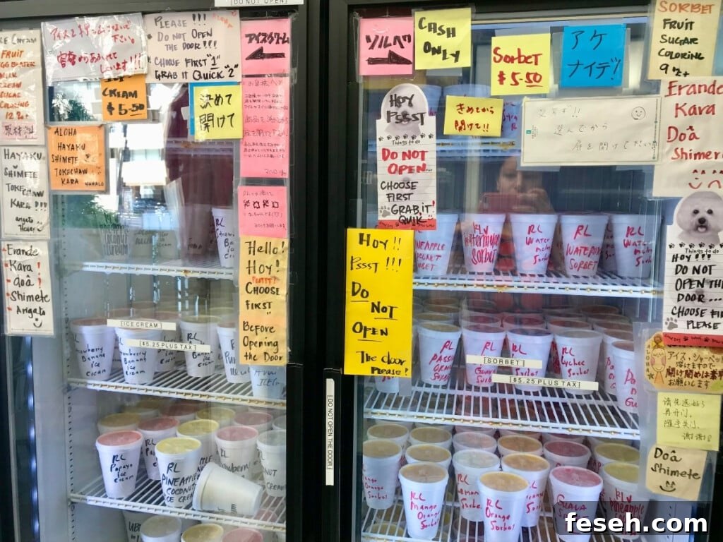 The refrigerator at Henryʻs Place in Waikīkī filled with sorbet flavors