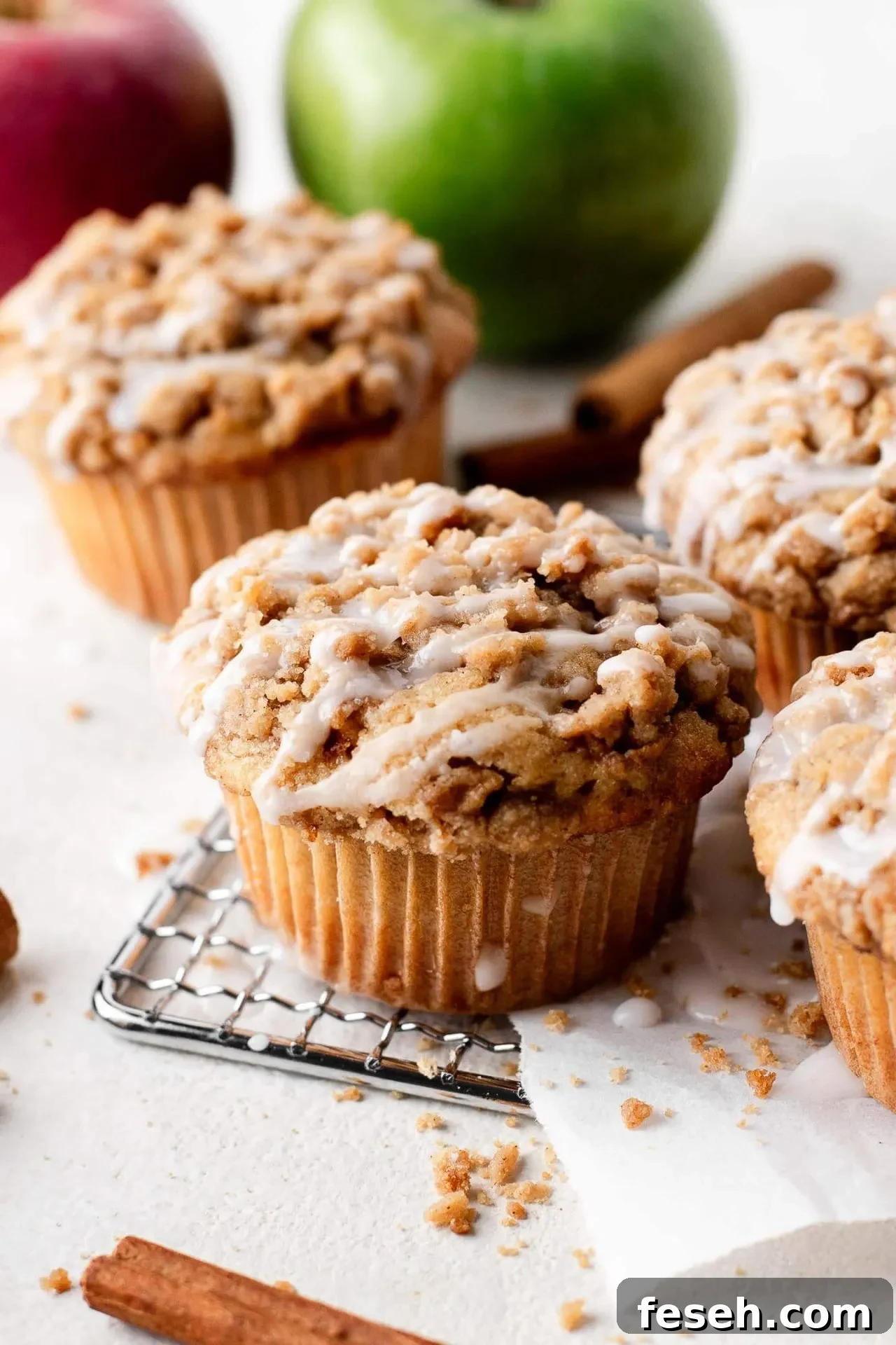 apple crumb muffins on wire rack
