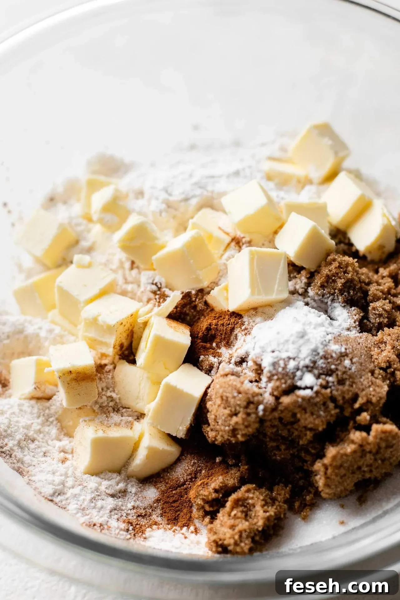 apple crumb muffins dry ingredients and butter combined in bowl