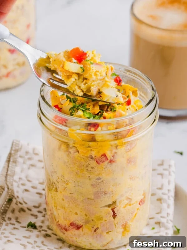 Just crack an egg (copycat) in a mason jar with a scoop of egg, red peppers and onions on a fork.