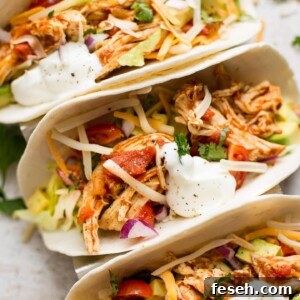 These Instant Pot chicken tacos are healthy and delicious. This easy family meal is ready in only 30 minutes, and it can be made with chicken breasts or thighs.