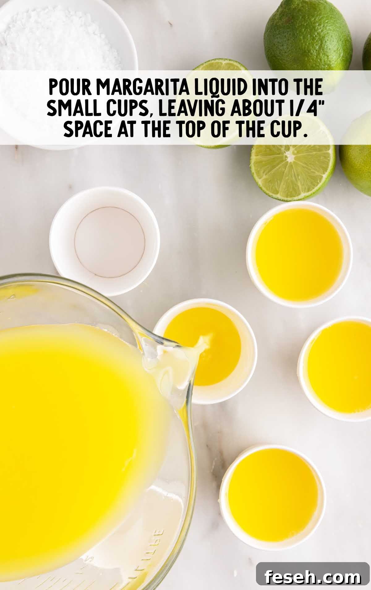 margarita liquid poured into the small cups