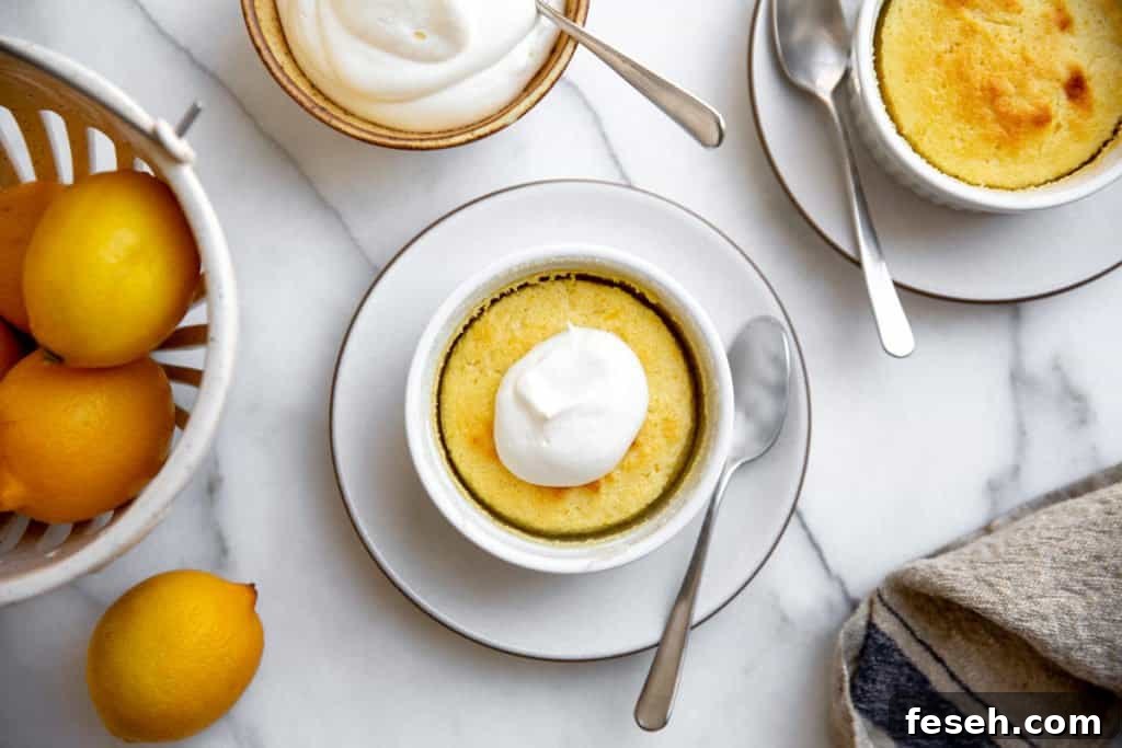 Gluten free lemon pudding cakes for Easter on a marble surface.