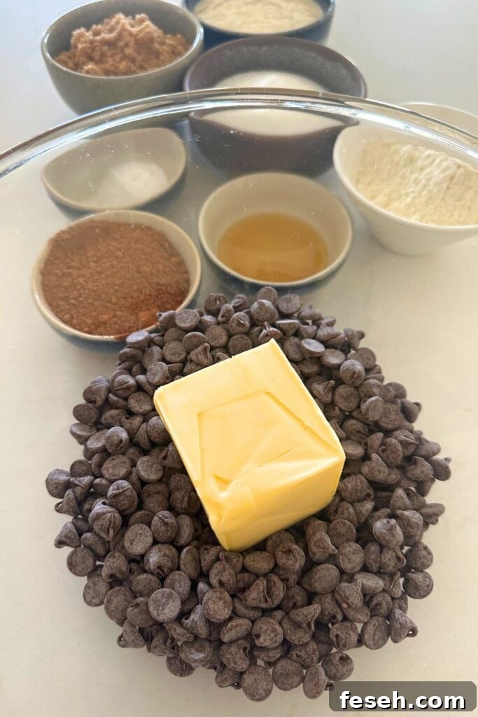 Melted chocolate and butter in a bowl.