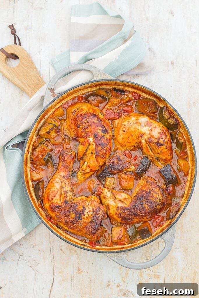 rich orange and red chicken stew from Easy Peasy Foodie