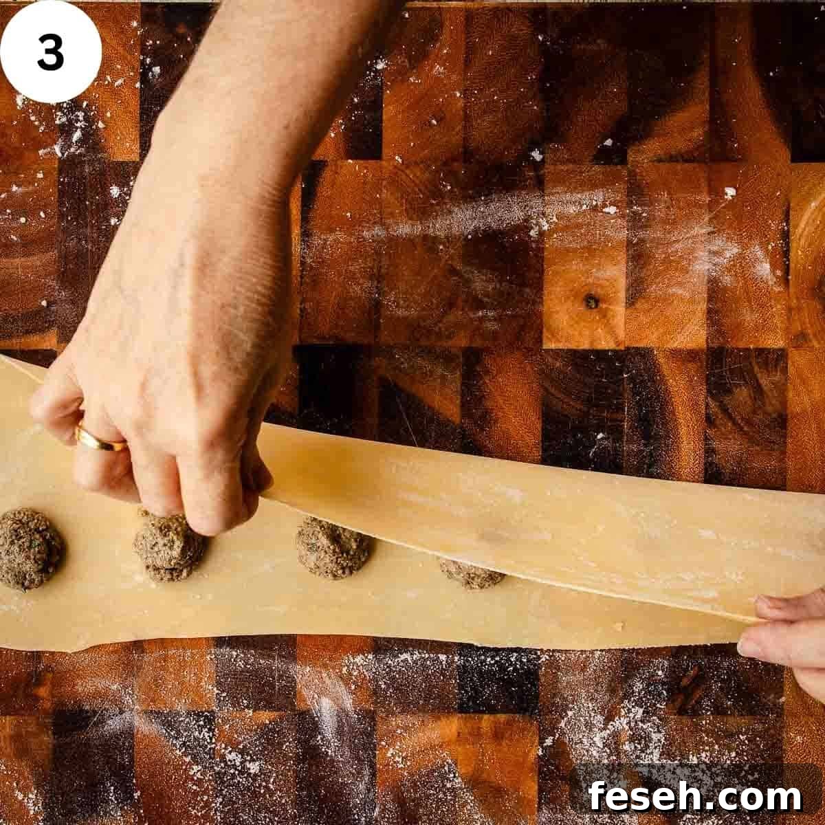 Folding thinned pasta dough over mounds of mushroom filling.