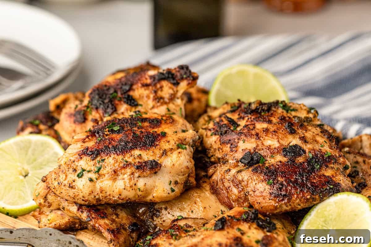 Grilled Pollo Asado arranged on serving board