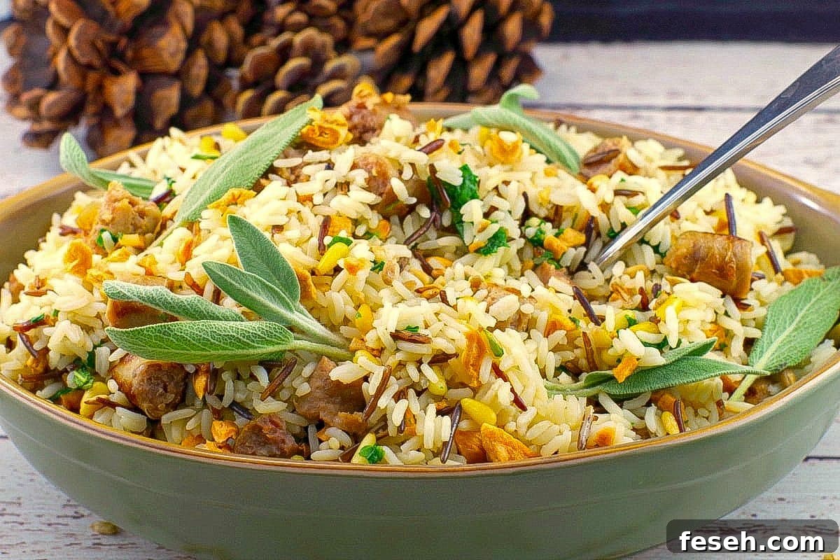Apple Rice (with sausage) in a green serving dish with spoon.