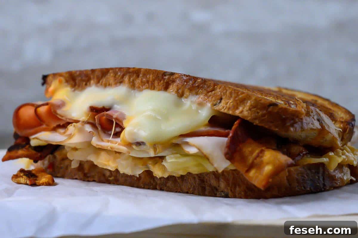 Bacon Reuben Sandwich on parchment paper.