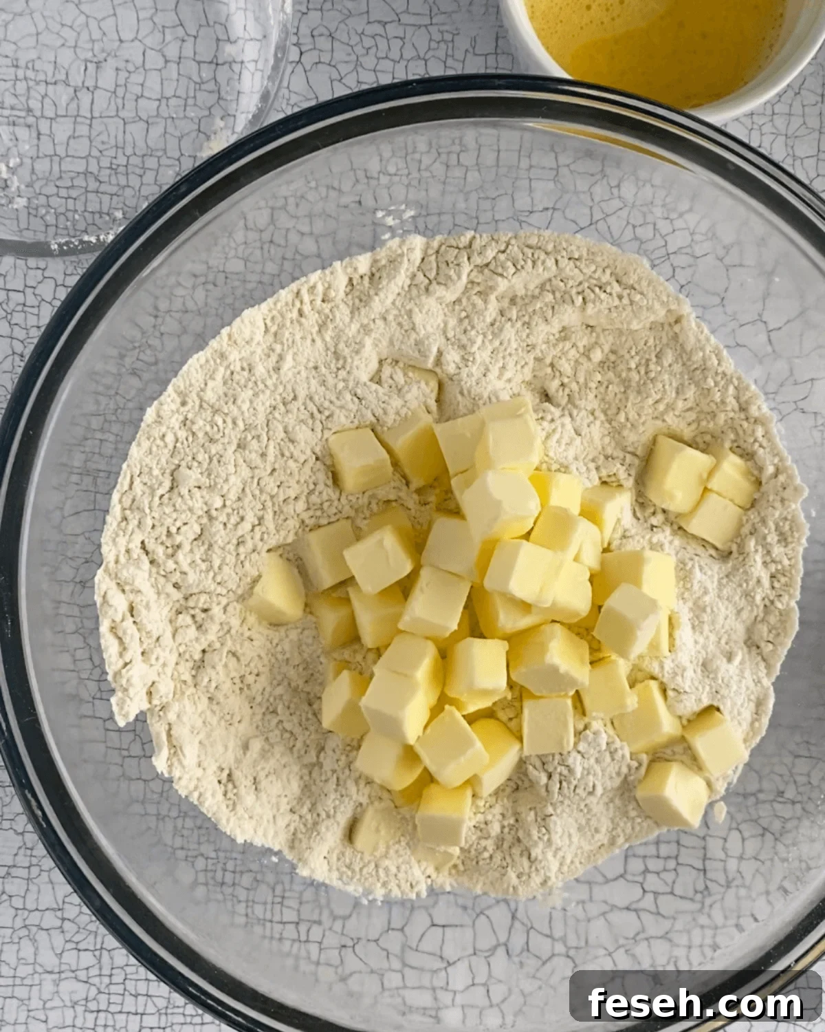 dry ingredients with cubes of butter on top