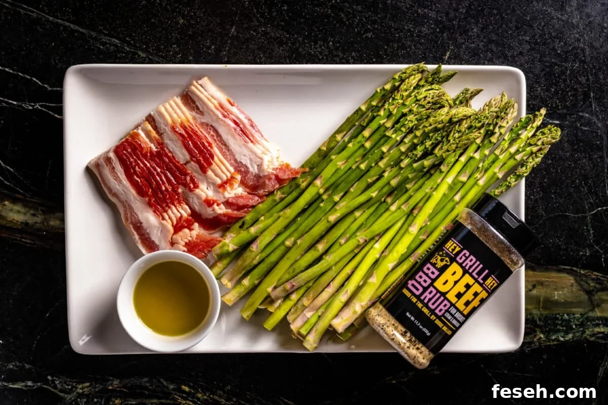 An overhead shot of a white plate with uncooked pork, vegetables, a cup of oil, and a bottle of Hey Grill Hey Beef Rub.