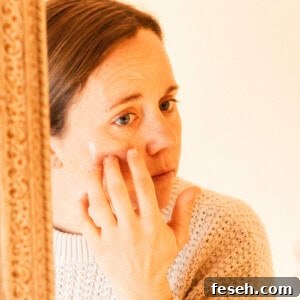 Applying the face mask to my cheek bones.