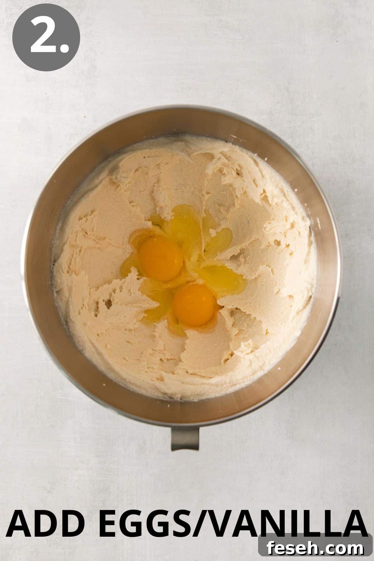 eggs and vanilla added to butter and sugar in a mixing bowl