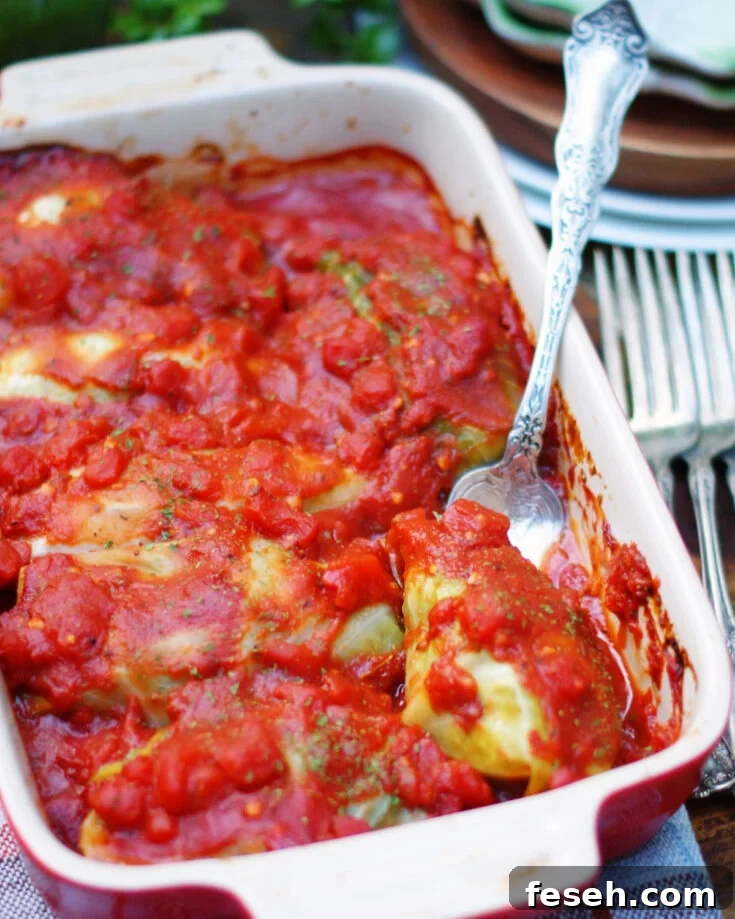 Southern style cabbage rolls with beef, pork, rice and a rich tomato sauce