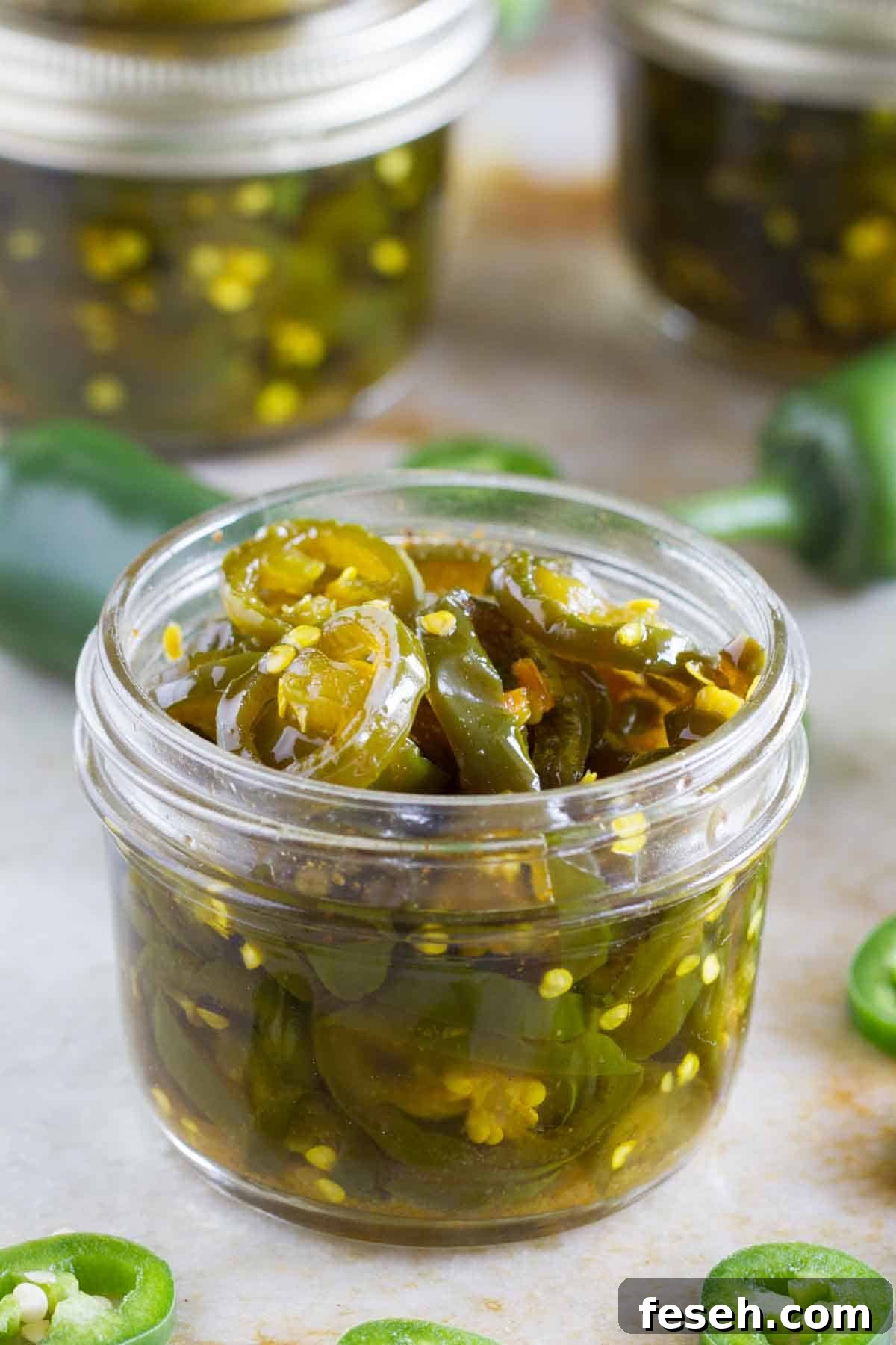 Candied Jalapeños in a jar.